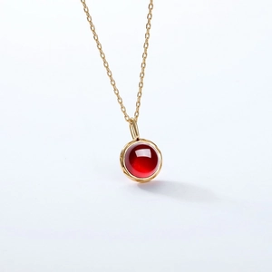 Minimalist S925 silver gold-plated necklace with a round red garnet gemstone pendant