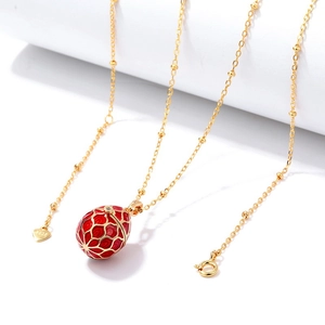 Elegant 925 sterling silver red enamel egg pendant necklace with golden filigree details