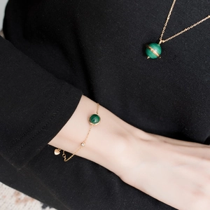 Parure bijoux vintage dorée avec collier pendentif planète malachite et bracelet fin