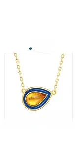 Macro detail of pear-shaped amber pendant with blue enamel in gold plated necklace