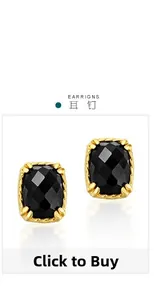 Detailed close-up of rectangular black faceted earrings with golden twisted metal frame