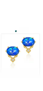 Macro detail of gold plated S925 silver earrings with blue opal and white zircon stones