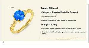 Detail of adjustable S925 silver 9K gold ring with 7mm blue opal and white zircon