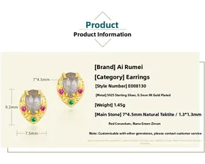 Detail showing S925 silver gold-plated leaf earrings with natural labradorite stone