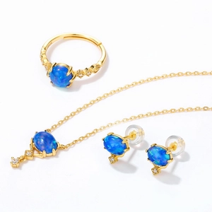 Vintage jewelry set with blue oval opal necklace, ring and earrings in gold-plated S925 silver