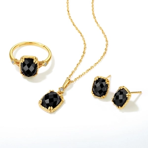 Gold-plated silver jewelry set featuring vintage black agate necklace, ring, and earrings