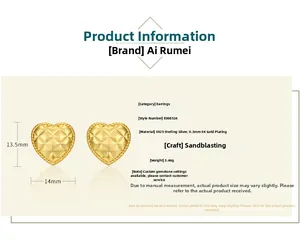 Detail view of S925 sterling silver heart studs with matte 9K gold sandblasted finish