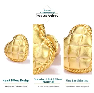 Macro detail of heart stud earring in 9K gold plated S925 silver with sandblasted finish