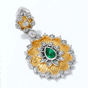 Detail of S925 sterling silver stamp on sunflower earrings with green gemstone