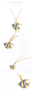 Detaillierte Makroaufnahme der Tropenfisch-Halskette mit blauem Spinell und Gold