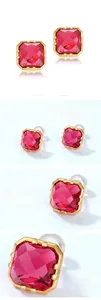 Detail view of square cut red corundum earring with gold-plated four-prong setting
