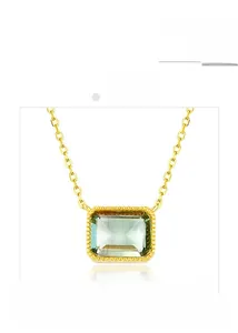 Close-up of geometric emerald necklace with gold plated S925 silver chain detail