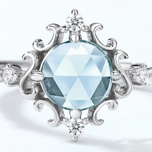 Vintage 925 silver flower ring with crown blue topaz gemstone and intricate scrollwork