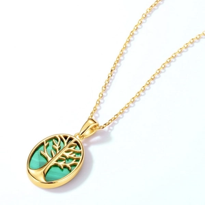 Pendentif arbre de vie doré avec malachite verte ovale sur une fine chaîne dorée