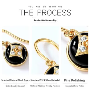 Macro detail of S925 silver black agate clover earrings with zircon inlay and gold plating