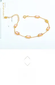 Detailed macro of gold-plated 925 silver bracelet with pink shell rectangular stones