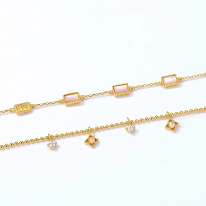 Elegant 925 silver gold-plated bracelet with geometric synthetic opal and pink gemstones