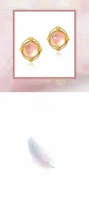 Detail of rose quartz bird stud earrings in gold plated 925 silver with pink feathers