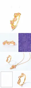 Macro detail of lilac flower ring with pink plique-a-jour enamel and S925 gold plating