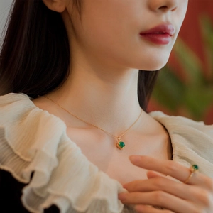 Elegant gold necklace with square green agate pendant and matching ring for women