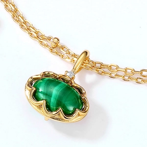 Vintage gold malachite and white crystal pendant with geometric S925 silver oval design