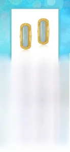 Detail of 925 silver amazonite stud earrings with gold plating and sunburst textures