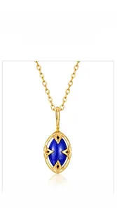 Detailed close-up of a vintage s925 gold lapis lazuli and crystal reversible pendant