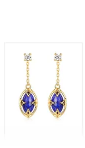 Detail of S925 silver earrings featuring lapis lazuli pendants and gold floral metalwork