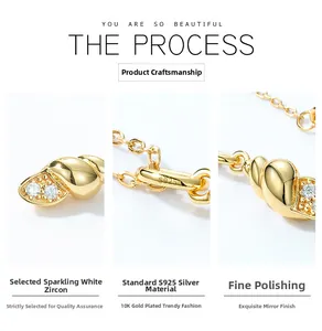 Detail of 925 sterling silver conch pendant with 10K gold plating and white zircon