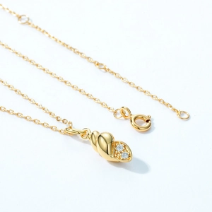 Golden seashell pendant necklace in 925 silver with cubic zirconia and shiny mirror finish