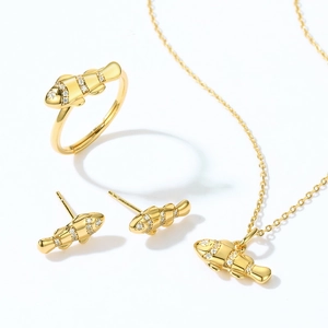 Parure bijoux poisson clown dorée avec zircons blancs comprenant bague collier et boucles