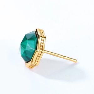 Detailed macro view of S925 hallmark on a vintage hexagonal malachite gold stud earring