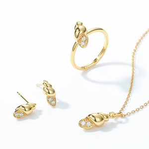 Golden conch jewelry set with 925 silver 10K gold plating and white zircon accents