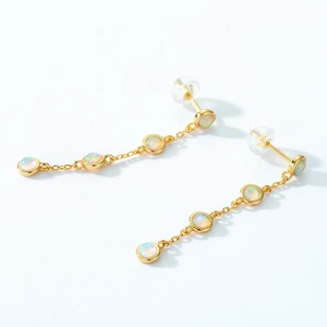 Elegant 925 silver gold-plated long drop earrings featuring four synthetic opal stones