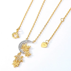 Elegante S925 zilveren ketting met esdoornblad en maan, zirkonia en goudkleurige plating