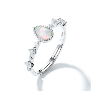 Detailed view of S925 silver ring featuring a pear-cut opal and zirconia accents