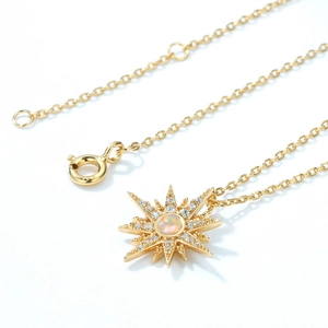 Minimalist S925 silver gold star necklace with opal and zircon inlay on white background