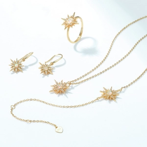 Elegant gold S925 silver sunburst jewelry set with opal and cubic zirconia stones