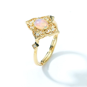Bague ouverte en argent S925 doré avec opale ovale et détails en zircone