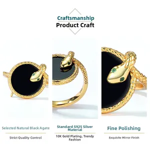 Detail of S925 silver snake ring with black onyx stone and green gem eyes decoration