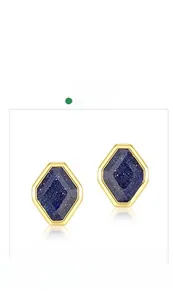 Macro shot of geometric hexagonal stud earrings with sparkling blue goldstone in S925 silver