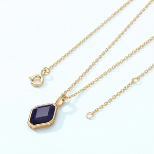 Retro S925 silver necklace featuring a geometric blue goldstone pendant with a gold finish