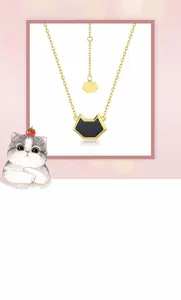 Close-up of geometric cat head necklace with black onyx inlay in 10K gold finish