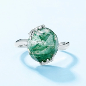 Elegant S925 silver ring featuring faceted oval moss agate with delicate leaf ornaments