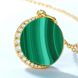 Elegant gold S925 silver necklace with a green malachite stone and crescent moon pendant
