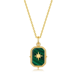 Detail of gold plated necklace featuring a rectangular malachite pendant with starburst motif