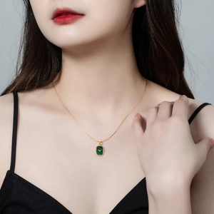 Elegant 925 silver gold-plated necklace with rectangular green malachite pendant on model
