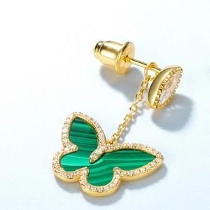 Macro shot of S925 sterling silver butterfly drop earring with green malachite stone