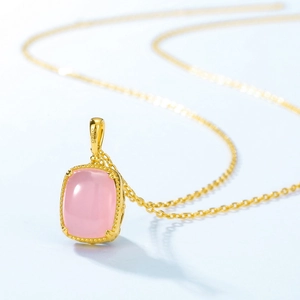 Classic S925 silver necklace with pink tiger eye stone pendant on blue background