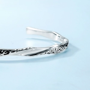 Japanese style silver bangle with retro vine pattern and rustic oxidized metal finish